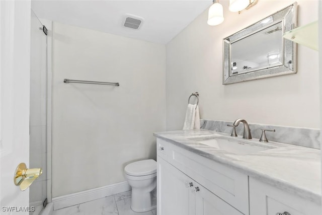 460 Broad Ave S Unit H460, Naples, FL 34102 - full bath with marble look tiles, vanity, toilet, baseboards, and a shower