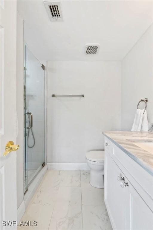 460 Broad Ave S Unit H460, Naples, FL 34102 - full bathroom featuring marble look tiles, vanity, an enclosed shower, toilet, and baseboards