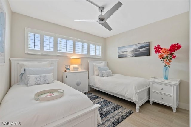 460 Broad Ave S Unit H460, Naples, FL 34102 - bedroom featuring light wood finished floors and a ceiling fan