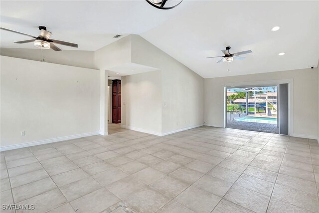 5012 SW 8th Pl, Cape Coral, FL 33914 - spare room featuring ceiling fan, vaulted ceiling, baseboards, and recessed lighting