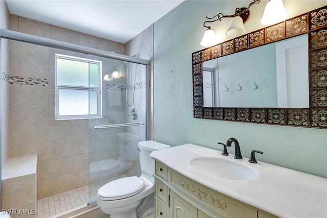 5012 SW 8th Pl, Cape Coral, FL 33914 - bathroom featuring toilet, vanity, and a shower stall