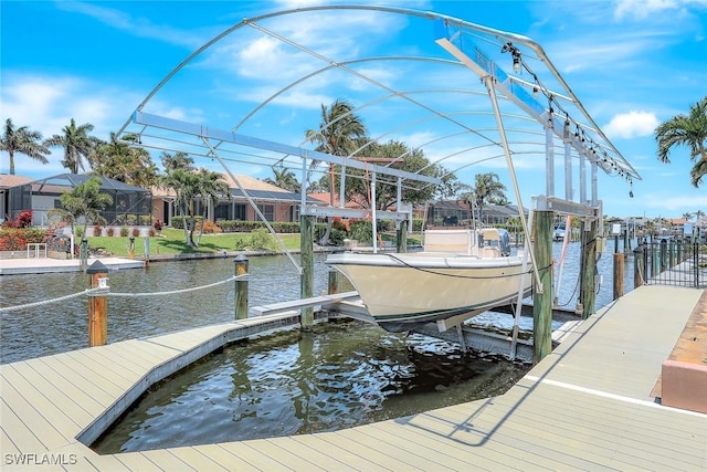 5012 SW 8th Pl, Cape Coral, FL 33914 - dock area featuring boat lift and a water view