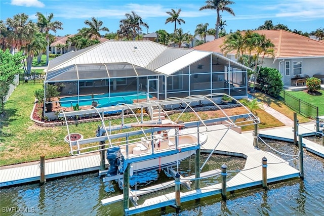 5012 SW 8th Pl, Cape Coral, FL 33914 - dock area with boat lift, an outdoor pool, a water view, a lanai, and a patio area