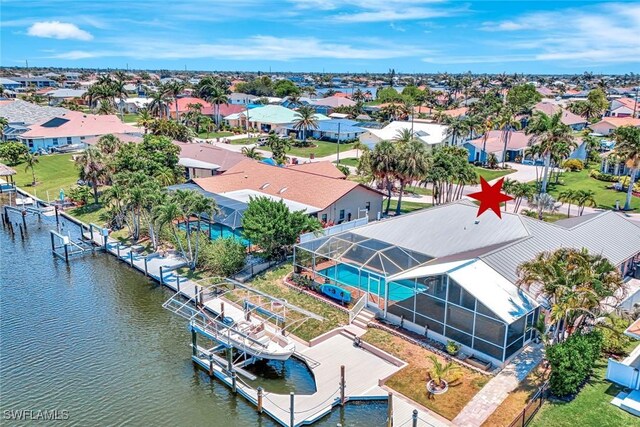 5012 SW 8th Pl, Cape Coral, FL 33914 - aerial perspective of suburban area featuring a nearby body of water