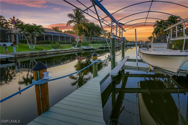 5012 SW 8th Pl, Cape Coral, FL 33914 - dock area featuring boat lift and a water view