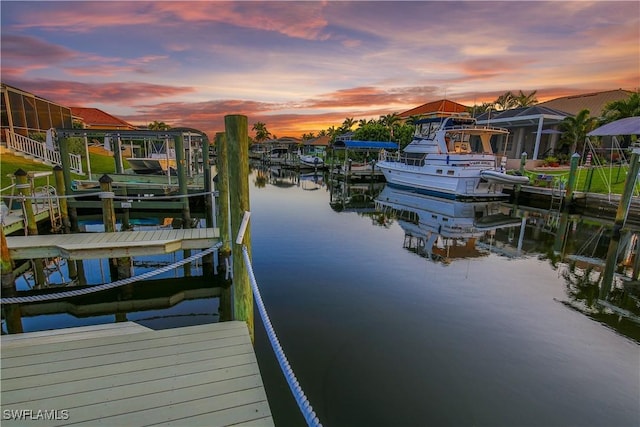 5012 SW 8th Pl, Cape Coral, FL 33914 - dock area featuring boat lift and a water view