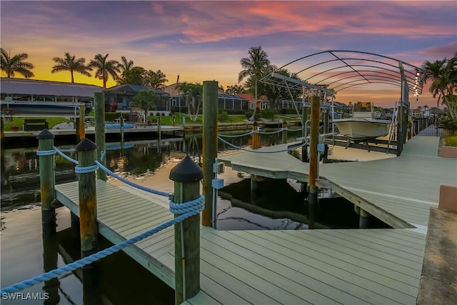 5012 SW 8th Pl, Cape Coral, FL 33914 - dock area with boat lift and a water view