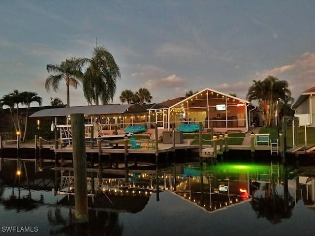 5012 SW 8th Pl, Cape Coral, FL 33914 - dock with boat lift and a water view