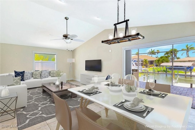 5012 SW 8th Pl, Cape Coral, FL 33914 - living area featuring ceiling fan, vaulted ceiling, and light tile patterned flooring