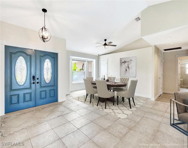 5012 SW 8th Pl, Cape Coral, FL 33914 - dining space with light tile patterned floors, vaulted ceiling, a ceiling fan, french doors, and baseboards