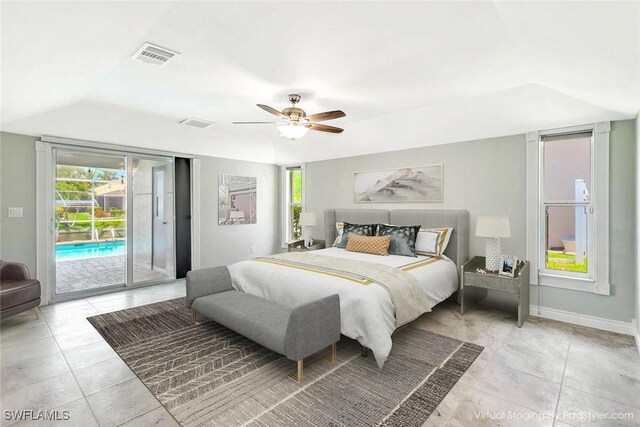 5012 SW 8th Pl, Cape Coral, FL 33914 - bedroom with access to exterior, light tile patterned floors, and multiple windows
