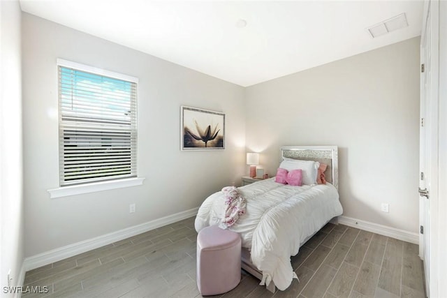 28086 Captiva Shell Loop, Bonita Springs, FL 34135 - bedroom featuring wood finish floors and baseboards