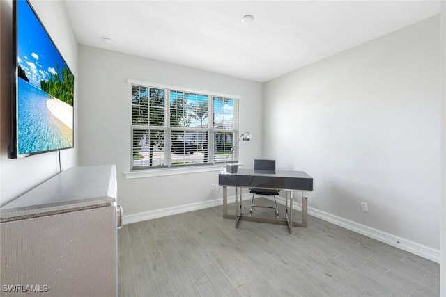 28086 Captiva Shell Loop, Bonita Springs, FL 34135 - office area with light wood-style flooring and baseboards