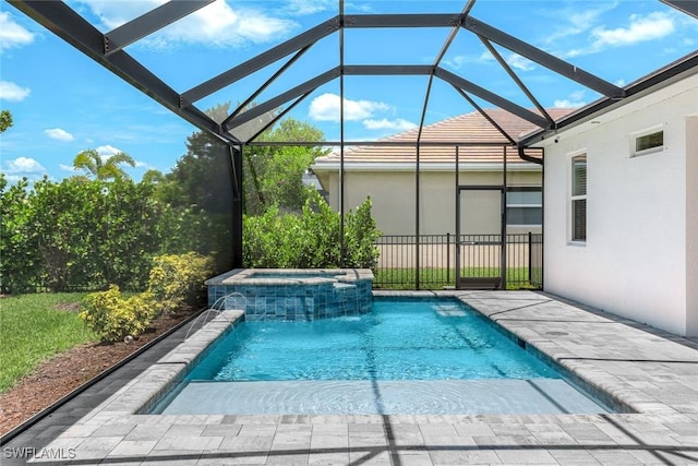 28086 Captiva Shell Loop, Bonita Springs, FL 34135 - view of swimming pool featuring glass enclosure and a pool with connected hot tub