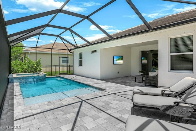 28086 Captiva Shell Loop, Bonita Springs, FL 34135 - view of pool featuring a patio, a pool with connected hot tub, and glass enclosure