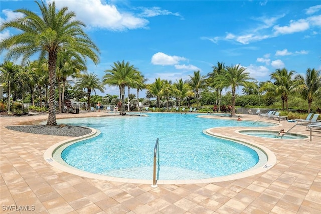 28086 Captiva Shell Loop, Bonita Springs, FL 34135 - community pool featuring a hot tub and a patio