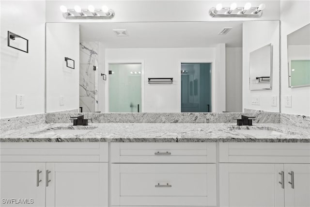 3613 39th St SW, Lehigh Acres, FL 33976 - full bath featuring double vanity and a marble finish shower