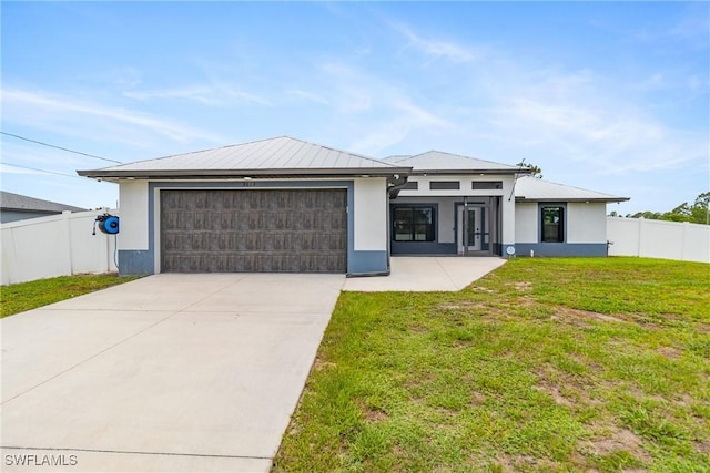 3613 39th St SW, Lehigh Acres, FL 33976 - prairie-style house featuring a garage, concrete driveway, and stucco siding