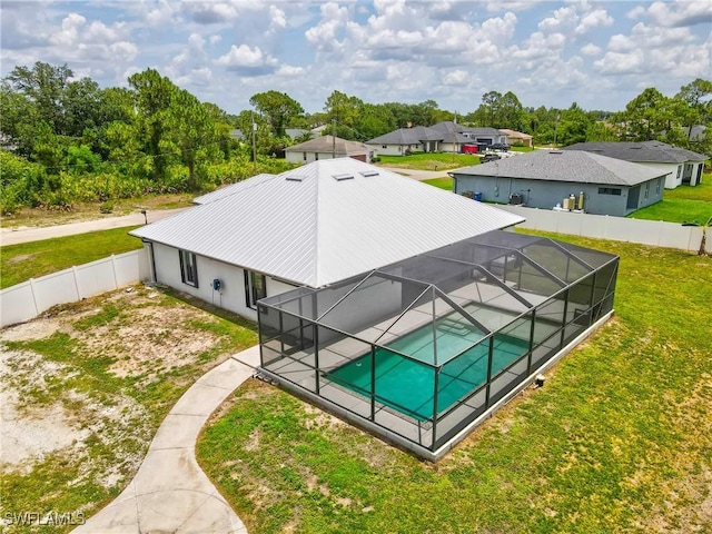 3613 39th St SW, Lehigh Acres, FL 33976 - view of pool with glass enclosure, a patio area, and a residential view