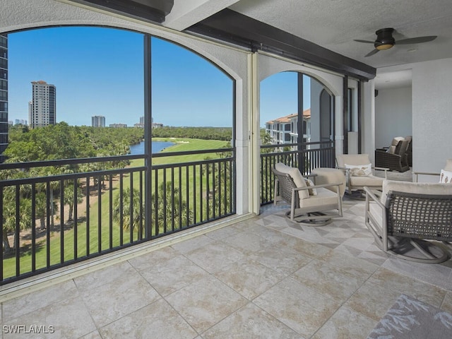 4701 Via Del Corso Ln Unit 401, Bonita Springs, FL 34134 - sunroom featuring a water view
