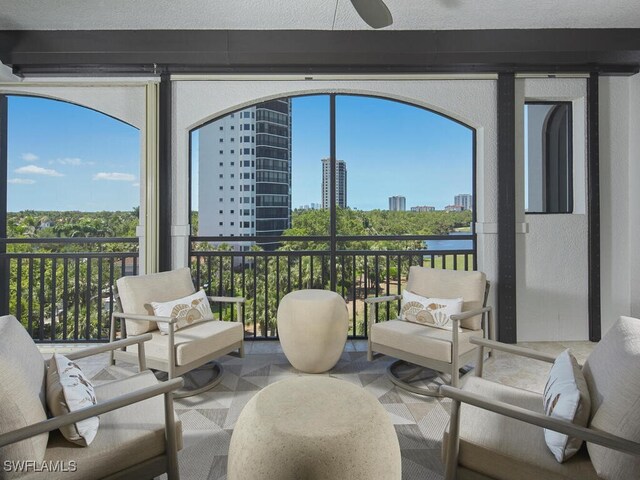 4701 Via Del Corso Ln Unit 401, Bonita Springs, FL 34134 - sunroom / solarium featuring a city view