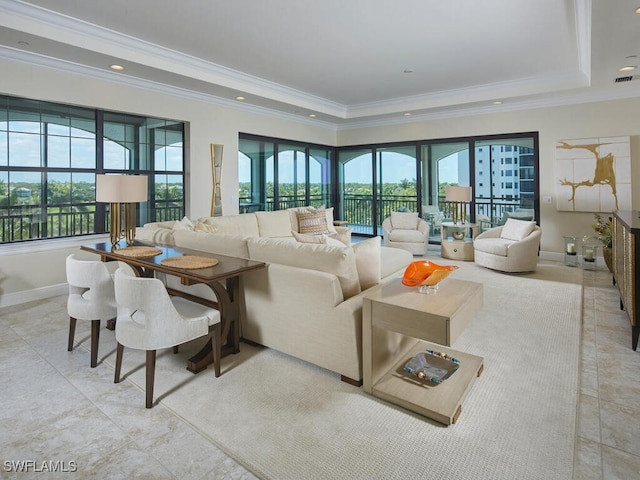 4701 Via Del Corso Ln Unit 401, Bonita Springs, FL 34134 - living area featuring a tray ceiling and ornamental molding
