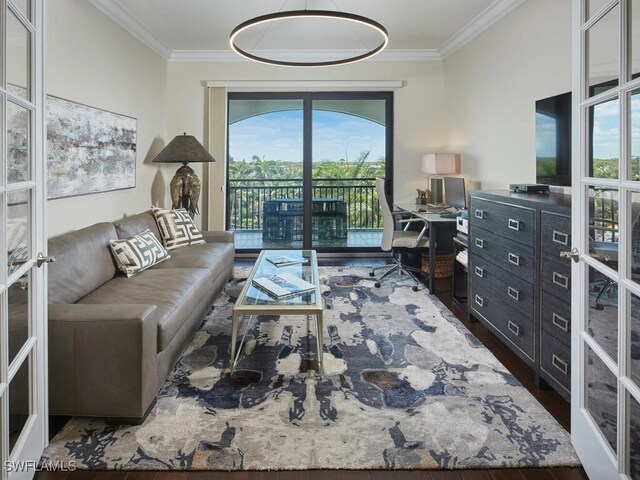 4701 Via Del Corso Ln Unit 401, Bonita Springs, FL 34134 - living room with plenty of natural light, wood finished floors, ornamental molding, french doors, and a desk