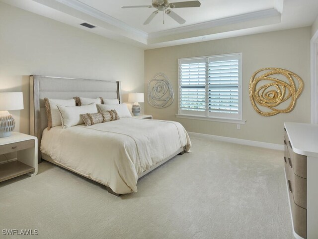 4701 Via Del Corso Ln Unit 401, Bonita Springs, FL 34134 - bedroom with a raised ceiling, ornamental molding, light colored carpet, and ceiling fan