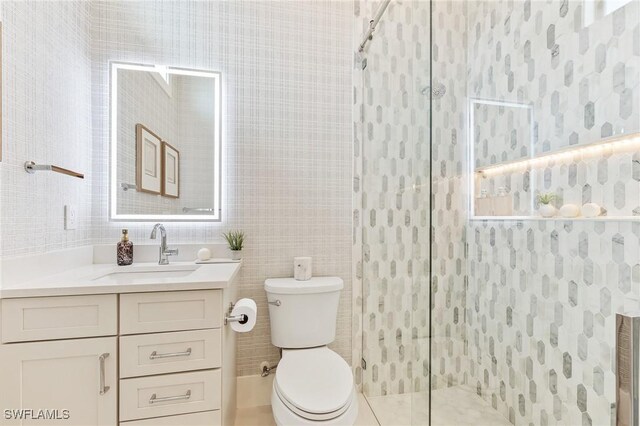 160 SW 52nd Ter, Cape Coral, FL 33914 - bathroom featuring toilet, vanity, a shower stall, and tile walls