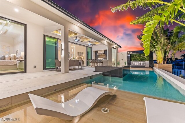 160 SW 52nd Ter, Cape Coral, FL 33914 - outdoor pool with a patio area and a ceiling fan