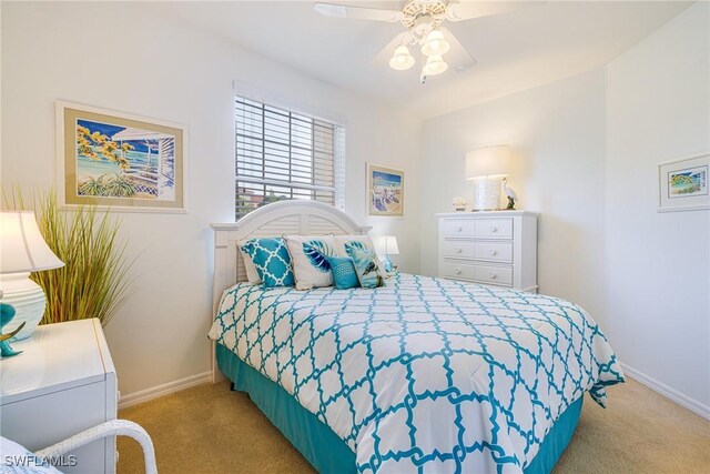4011 Palm Tree Blvd Unit 208, Cape Coral, FL 33904 - bedroom featuring carpet floors, baseboards, and ceiling fan