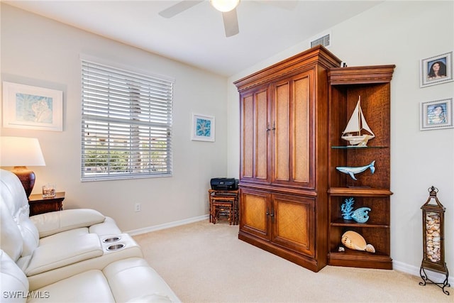 4011 Palm Tree Blvd Unit 208, Cape Coral, FL 33904 - living room featuring ceiling fan, light carpet, and baseboards