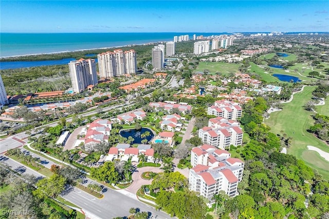 6500 Valen Way Unit A402, Naples, FL 34108 - aerial overview of property's location with a nearby body of water, a golf course, and nearby urban area