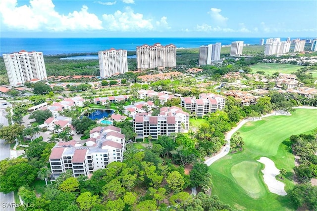 6500 Valen Way Unit A402, Naples, FL 34108 - drone / aerial view of a golf course and a nearby body of water