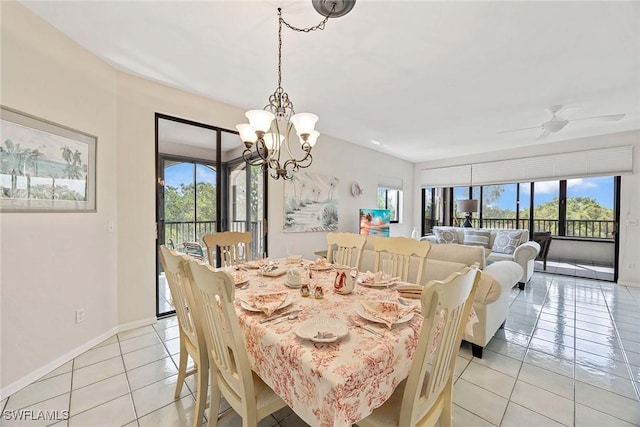 6500 Valen Way Unit A402, Naples, FL 34108 - dining room with light tile patterned flooring, a chandelier, baseboards, and ceiling fan