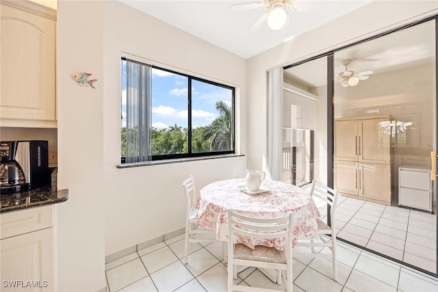 6500 Valen Way Unit A402, Naples, FL 34108 - dining area featuring ceiling fan and light tile patterned flooring