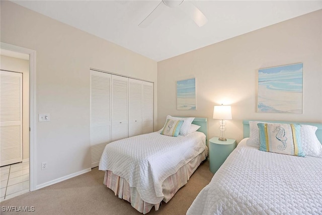 6500 Valen Way Unit A402, Naples, FL 34108 - carpeted bedroom with a closet, a ceiling fan, and baseboards