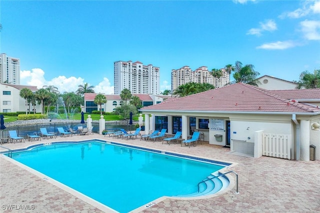 6500 Valen Way Unit A402, Naples, FL 34108 - community pool with a patio area