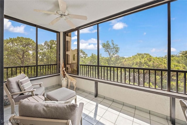 6500 Valen Way Unit A402, Naples, FL 34108 - sunroom / solarium featuring tile patterned floors and a view of trees