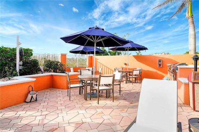 3191 Matecumbe Key Rd Unit 607, Punta Gorda, FL 33955 - view of patio / terrace with outdoor dining area