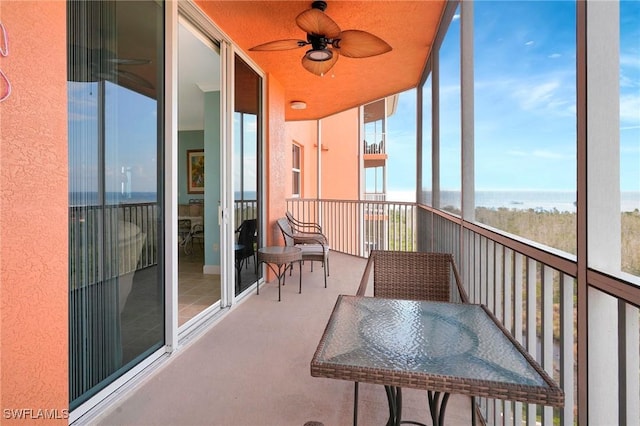 3191 Matecumbe Key Rd Unit 607, Punta Gorda, FL 33955 - sunroom with ceiling fan and a water view
