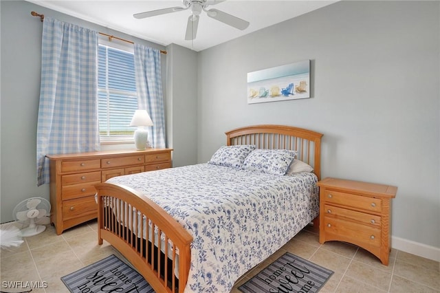 3191 Matecumbe Key Rd Unit 607, Punta Gorda, FL 33955 - bedroom featuring light tile patterned floors and a ceiling fan