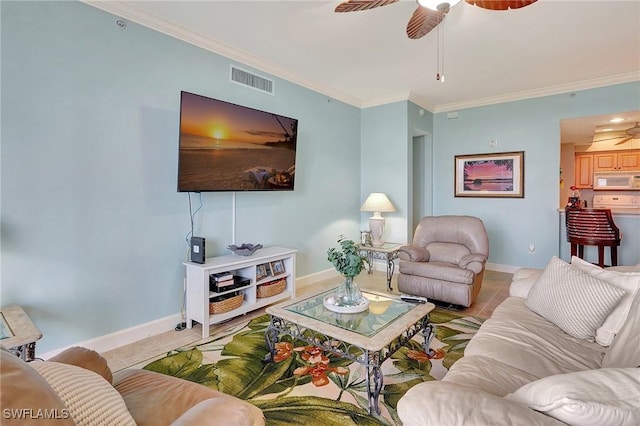 3191 Matecumbe Key Rd Unit 607, Punta Gorda, FL 33955 - living area featuring ceiling fan, tile patterned flooring, and crown molding