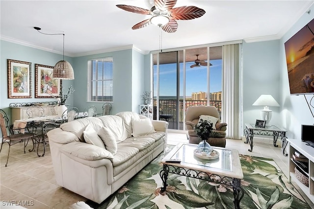 3191 Matecumbe Key Rd Unit 607, Punta Gorda, FL 33955 - living area featuring light tile patterned flooring, ceiling fan, and crown molding