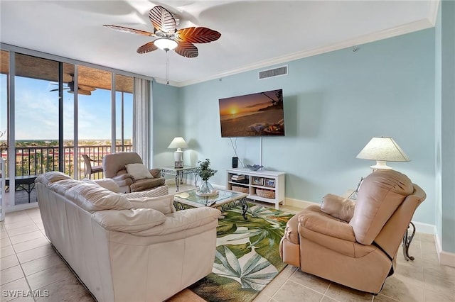 3191 Matecumbe Key Rd Unit 607, Punta Gorda, FL 33955 - living area featuring light tile patterned flooring, ceiling fan, and crown molding