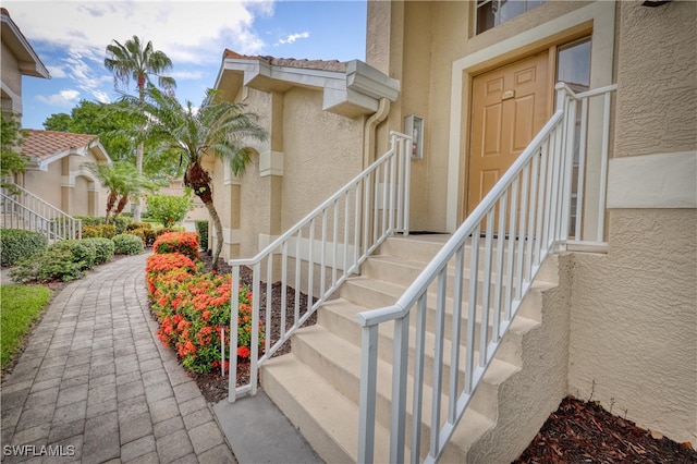 14561 Glen Cove Dr Unit 904, Fort Myers, FL 33919 - property entrance featuring stucco siding