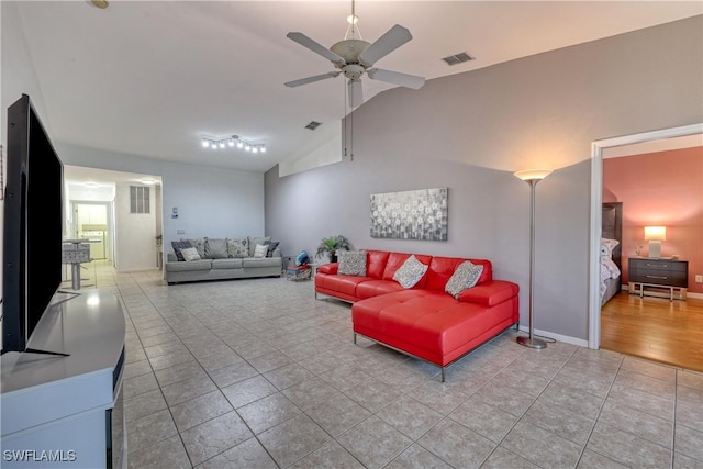 14561 Glen Cove Dr Unit 904, Fort Myers, FL 33919 - tiled living area featuring vaulted ceiling, ceiling fan, and baseboards