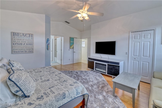 14561 Glen Cove Dr Unit 904, Fort Myers, FL 33919 - bedroom with vaulted ceiling, wood finished floors, and ceiling fan