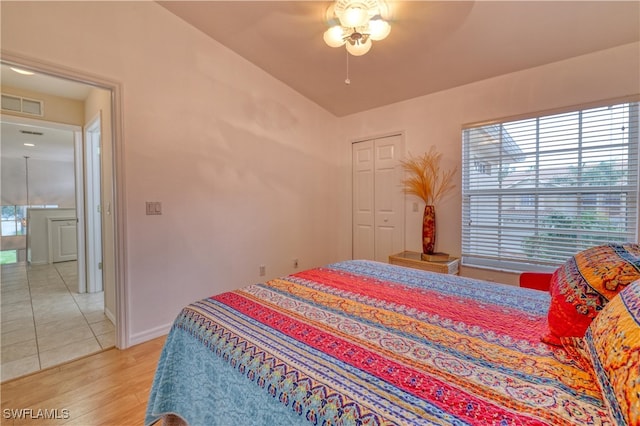 14561 Glen Cove Dr Unit 904, Fort Myers, FL 33919 - bedroom with light wood-type flooring, ceiling fan, and baseboards
