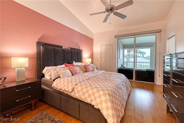 14561 Glen Cove Dr Unit 904, Fort Myers, FL 33919 - bedroom featuring access to exterior, hardwood / wood-style flooring, vaulted ceiling, and ceiling fan